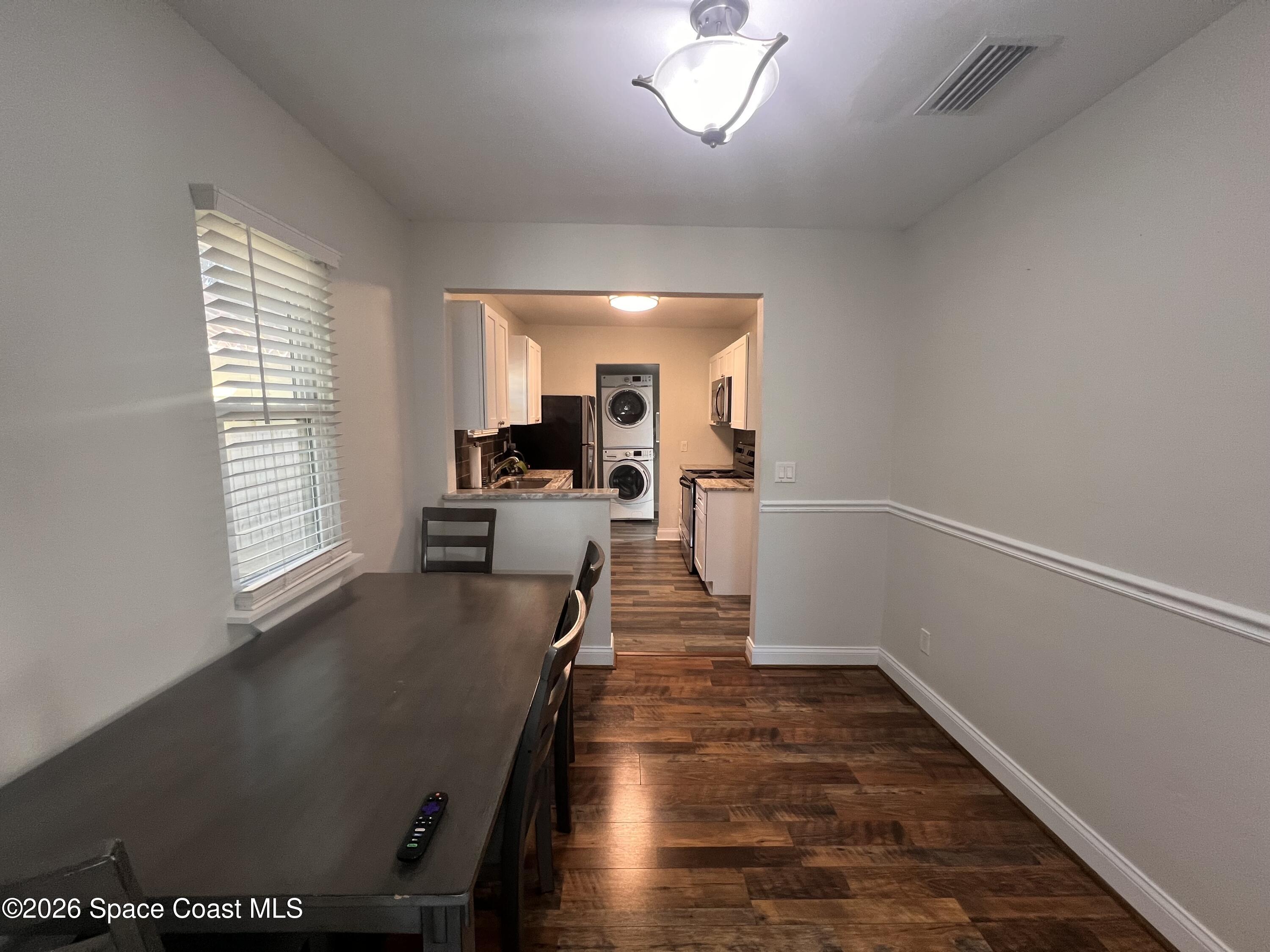 1935 Oak Street Melbourne, FL 32901 - Photo 6 of 13 a view of a living room and dining room