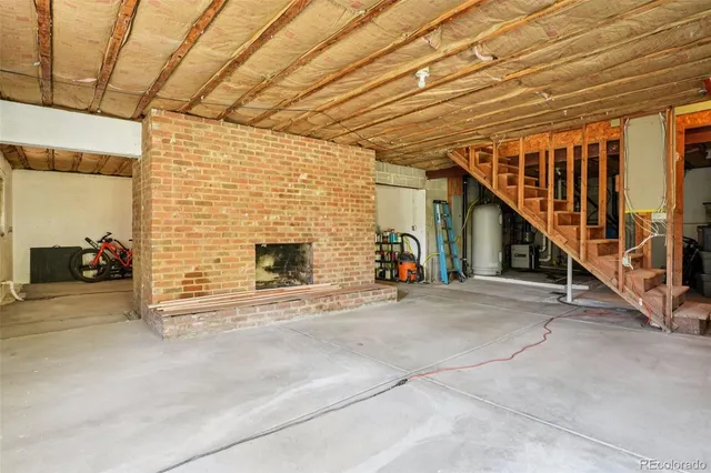 a view of an empty room with stairs