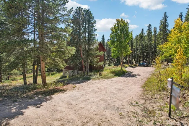 a view of road with trees