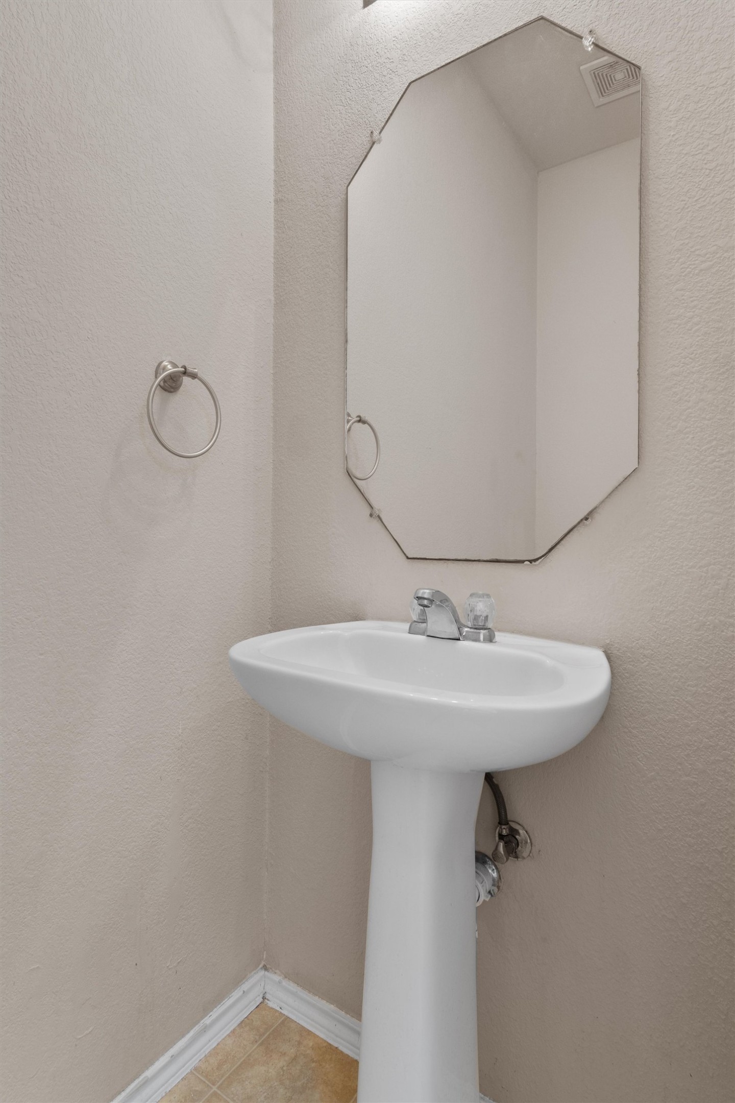 13720 Harris Ridge Boulevard, Unit A Pflugerville, TX 78660 - Photo 12 of 27 Bathroom featuring a textured wall and light tile patterned floors