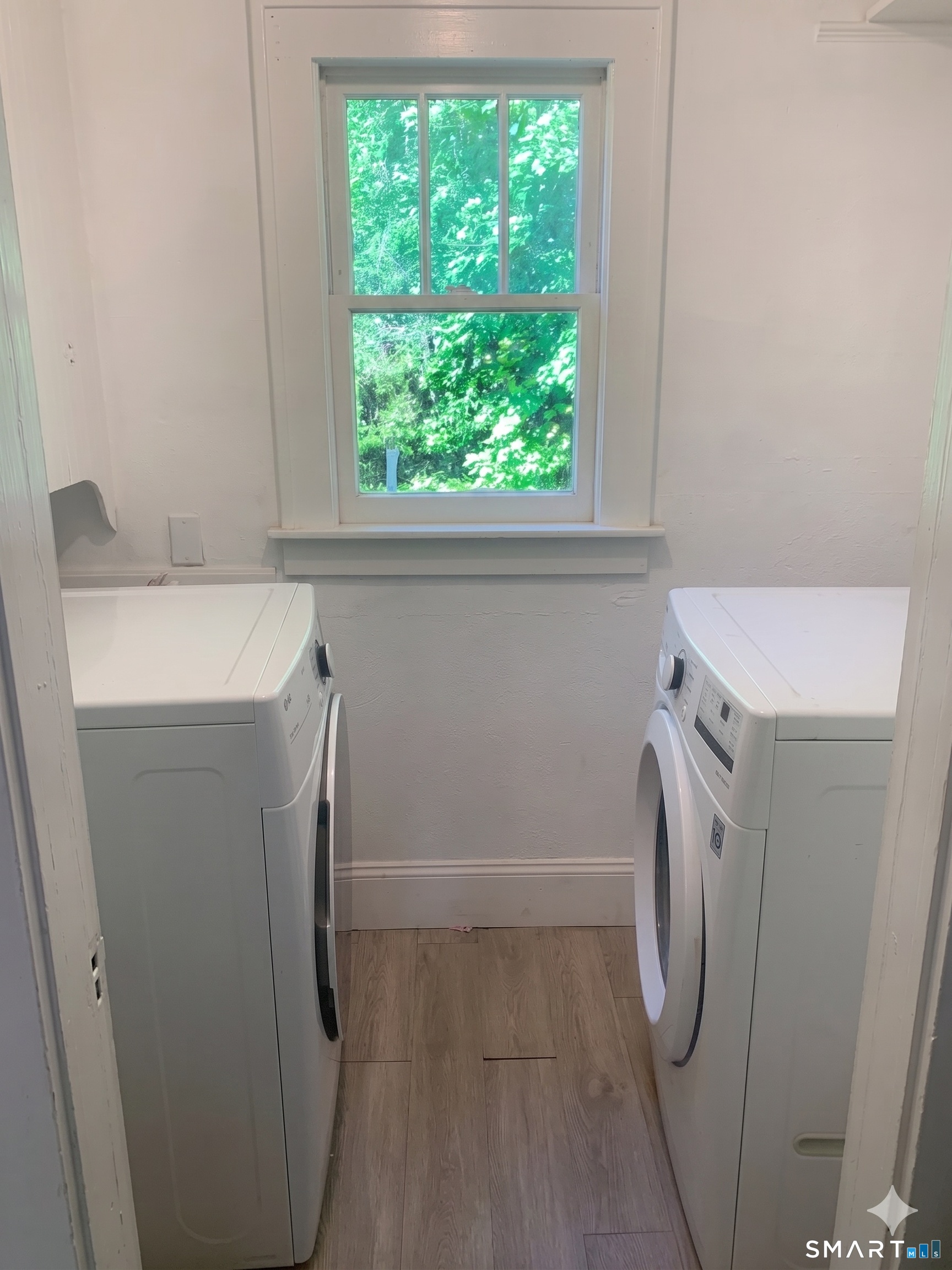 44 Bird Street Torrington, CT 06790 - Photo 14 of 17 a utility room with dryer and washer