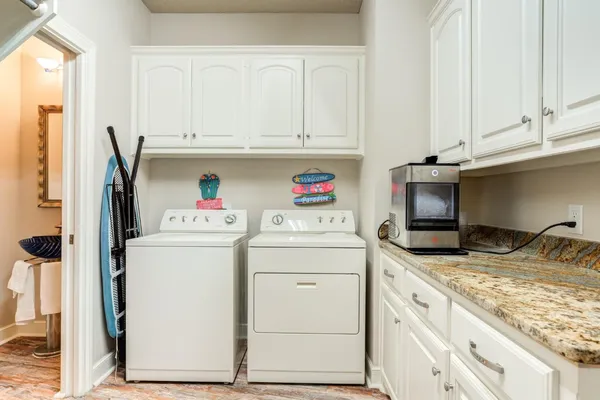 a utility room with dryer and washer