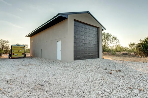 a house view with a backyard space