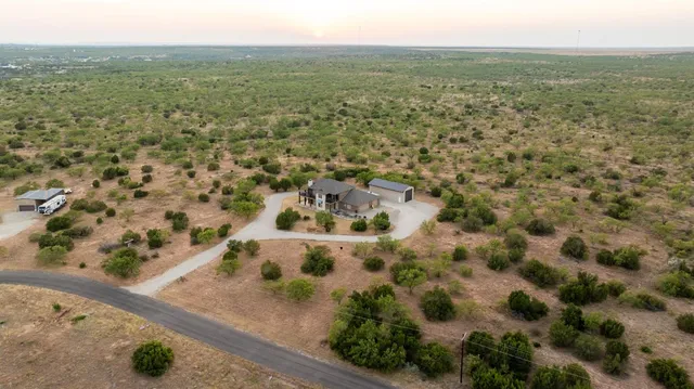 a view of city with ocean