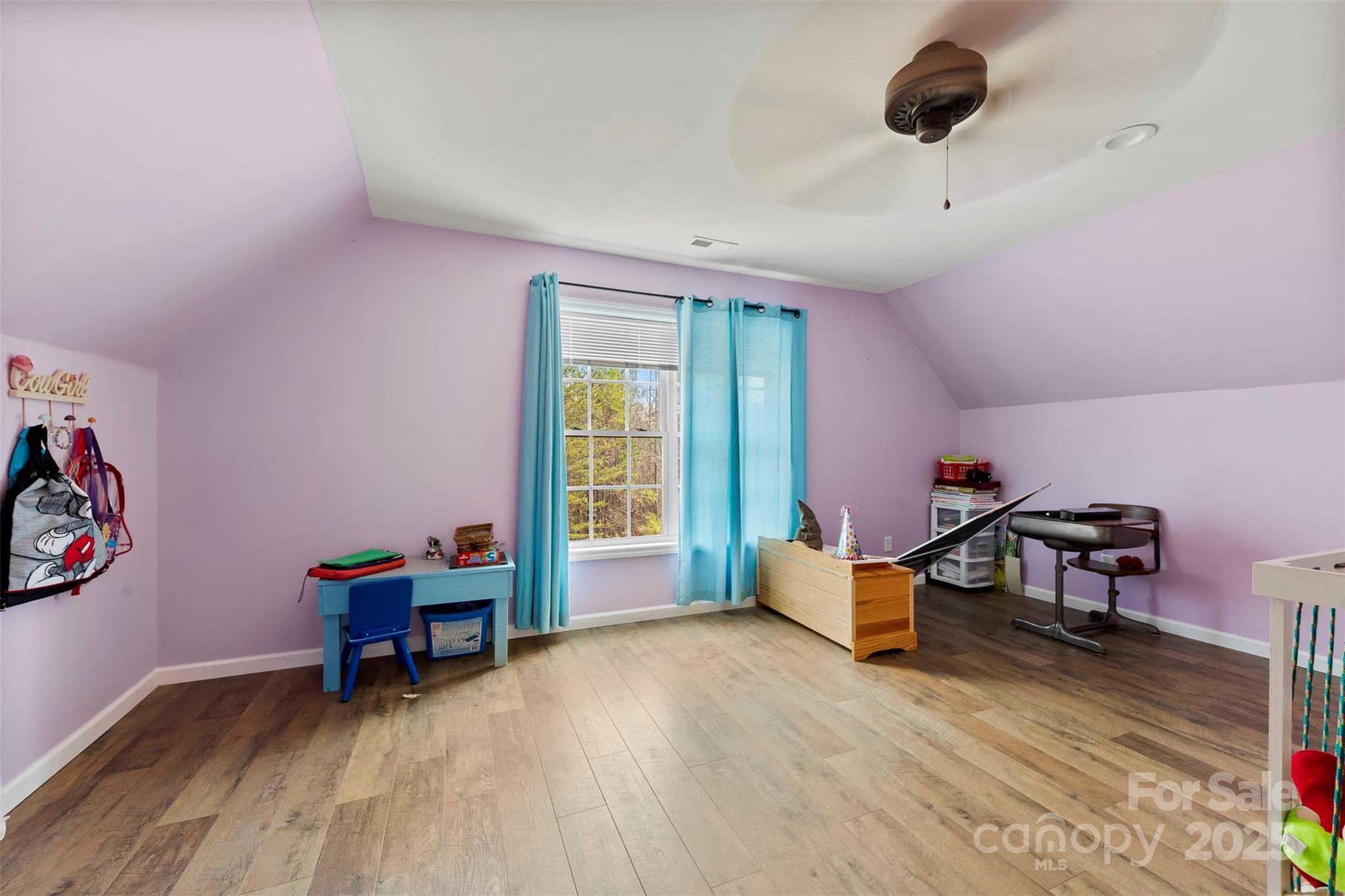 1581 Rhyne Road Dallas, NC 28034 - Photo 24 of 25 a living room with furniture and a wooden floor