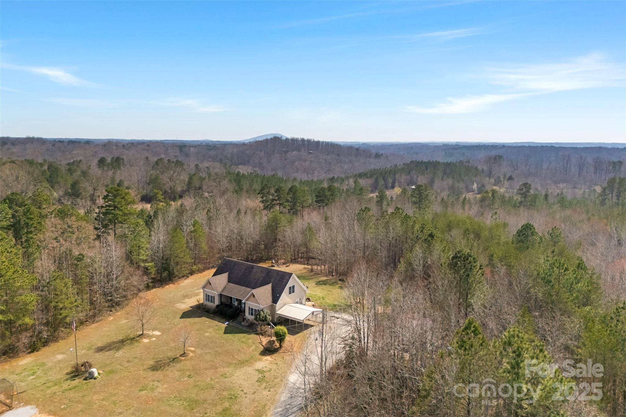1581 Rhyne Road Dallas, NC 28034 - Photo 3 of 25 a view of a lake with a mountain