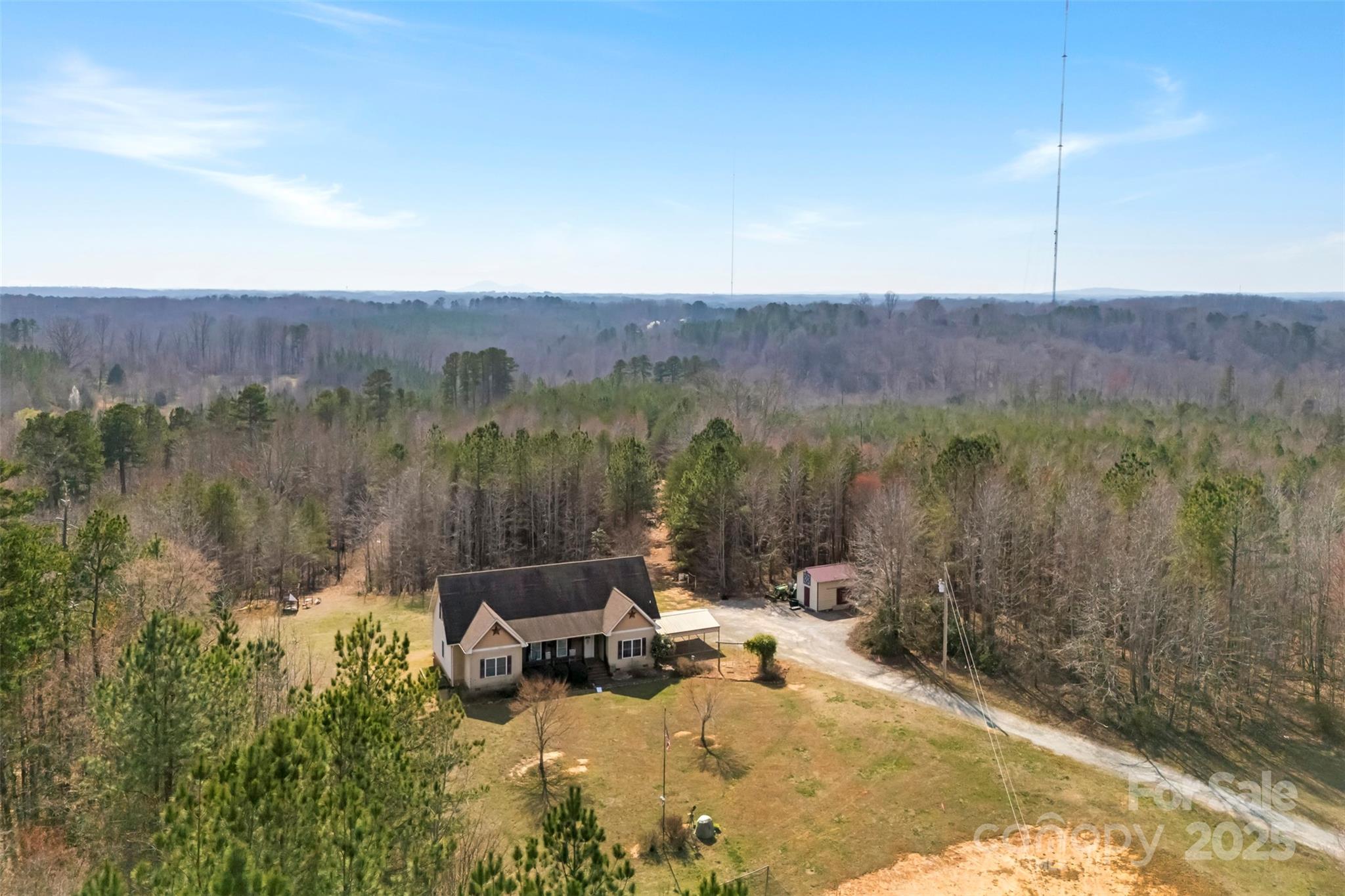 1581 Rhyne Road Dallas, NC 28034 - Photo 4 of 25 a view of a lake with a mountain view
