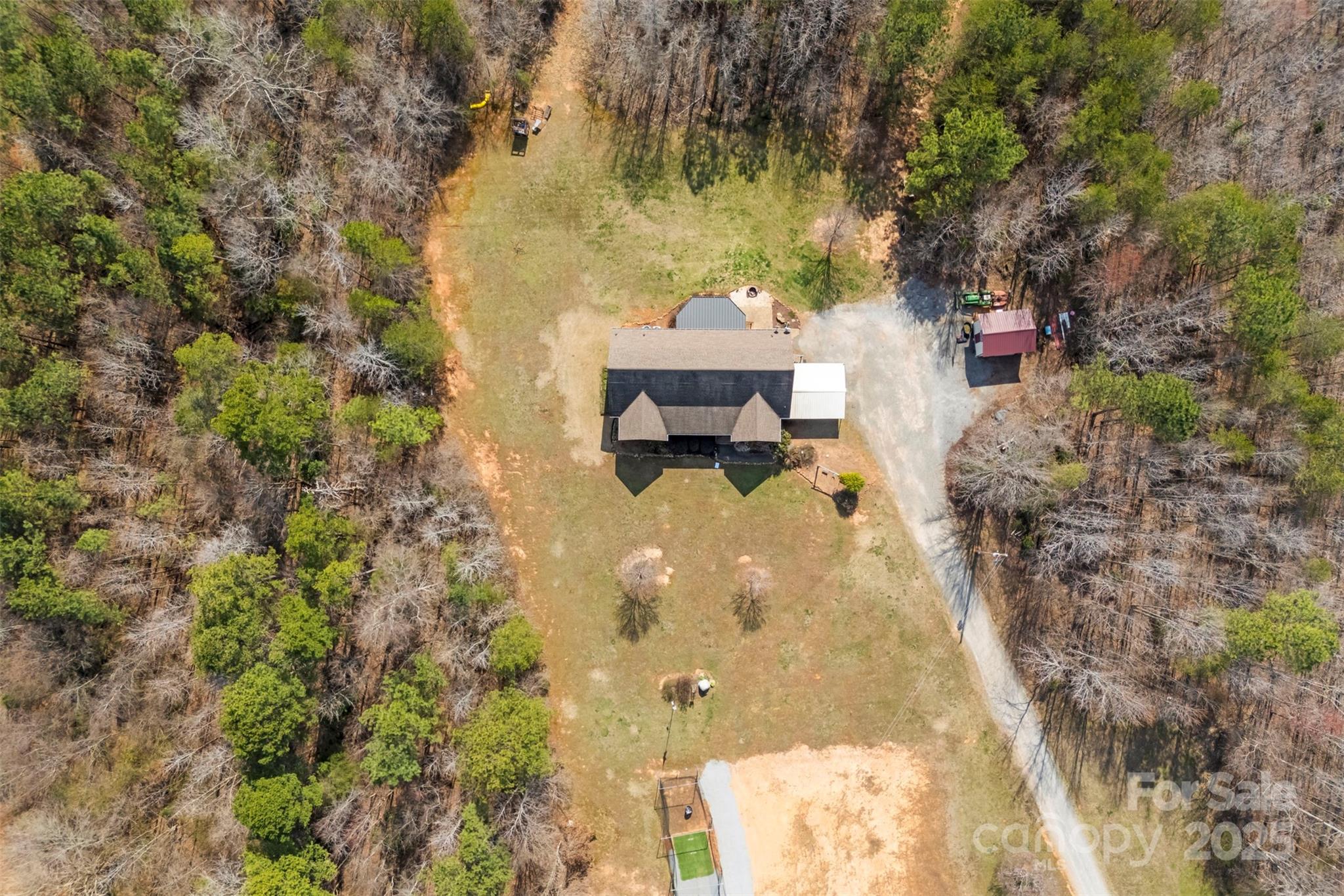 1581 Rhyne Road Dallas, NC 28034 - Photo 5 of 25 an aerial view of a house with a yard
