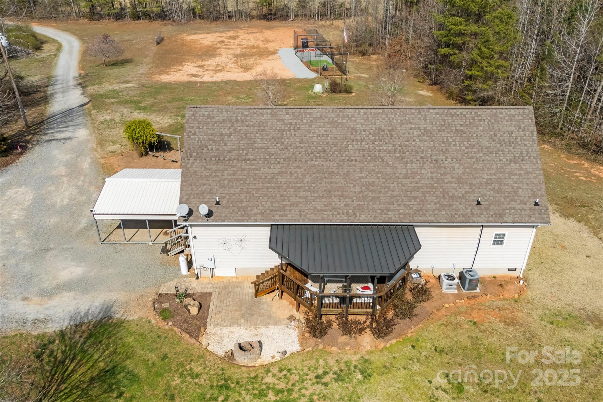 1581 Rhyne Road Dallas, NC 28034 - Photo 6 of 25 an aerial view of a house with swimming pool