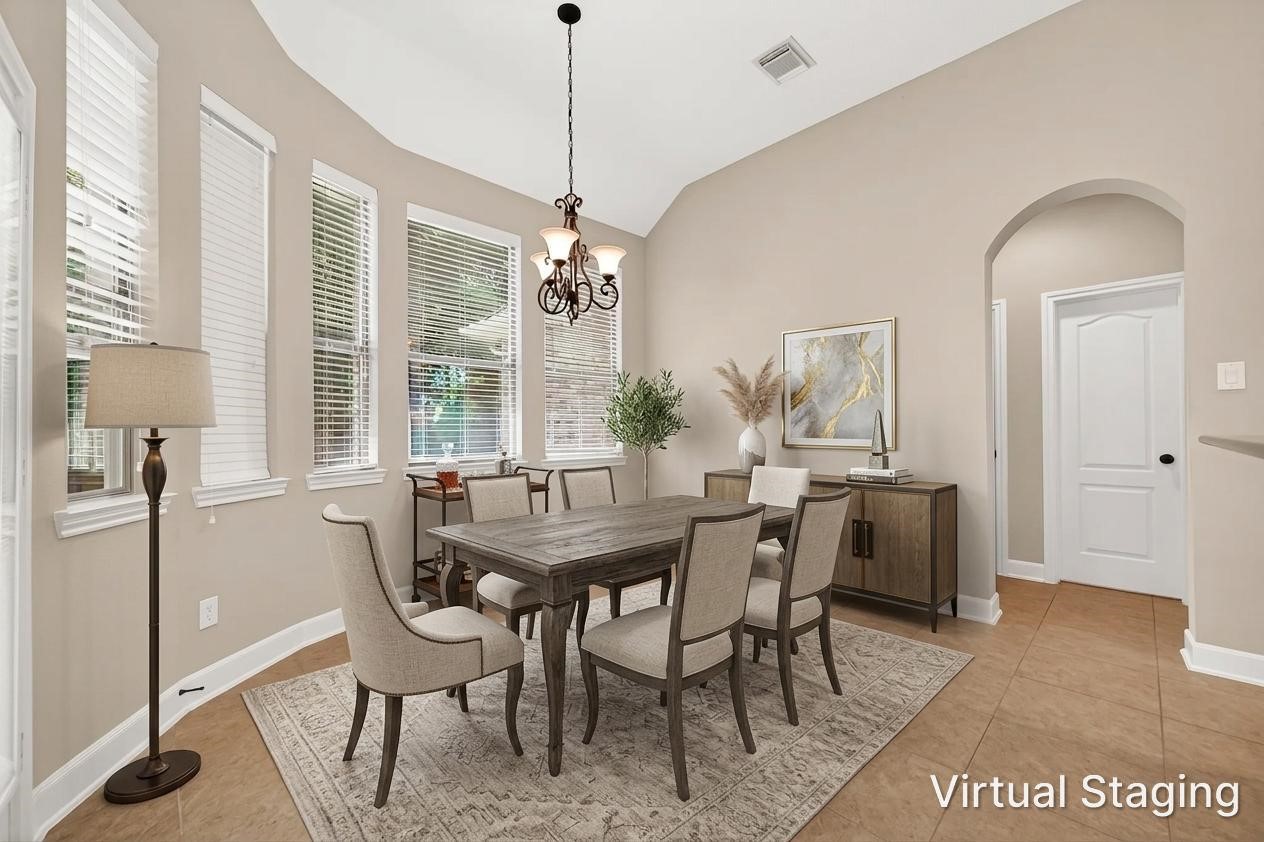 2310 Spring Lake Park Lane Spring, TX 77386 - Photo 14 of 47 a view of a dining room with furniture window and wooden floor