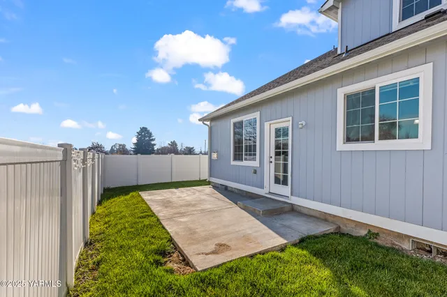 a view of a backyard with a garden