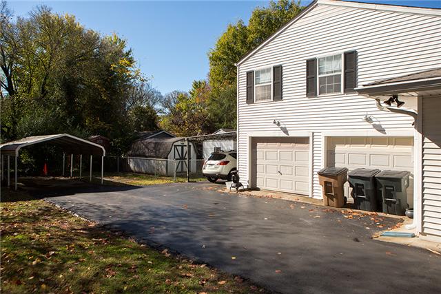 487 Hogan Road Nashville, TN 37220 - Photo 16 of 17 Oversized 2-car garage and 2-carports provide plenty of opportunity for parking family and guests.