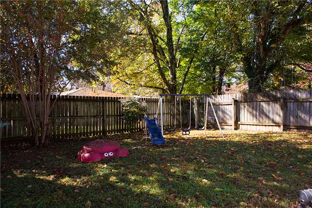 487 Hogan Road Nashville, TN 37220 - Photo 17 of 17 Level lot and fenced yard provide a good area for children to play.