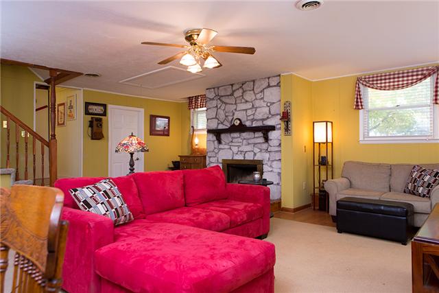 487 Hogan Road Nashville, TN 37220 - Photo 6 of 17 Yet another large room that could be used as a Den or Playroom. Easy access to the 2-car garage and Master Suite upstairs.