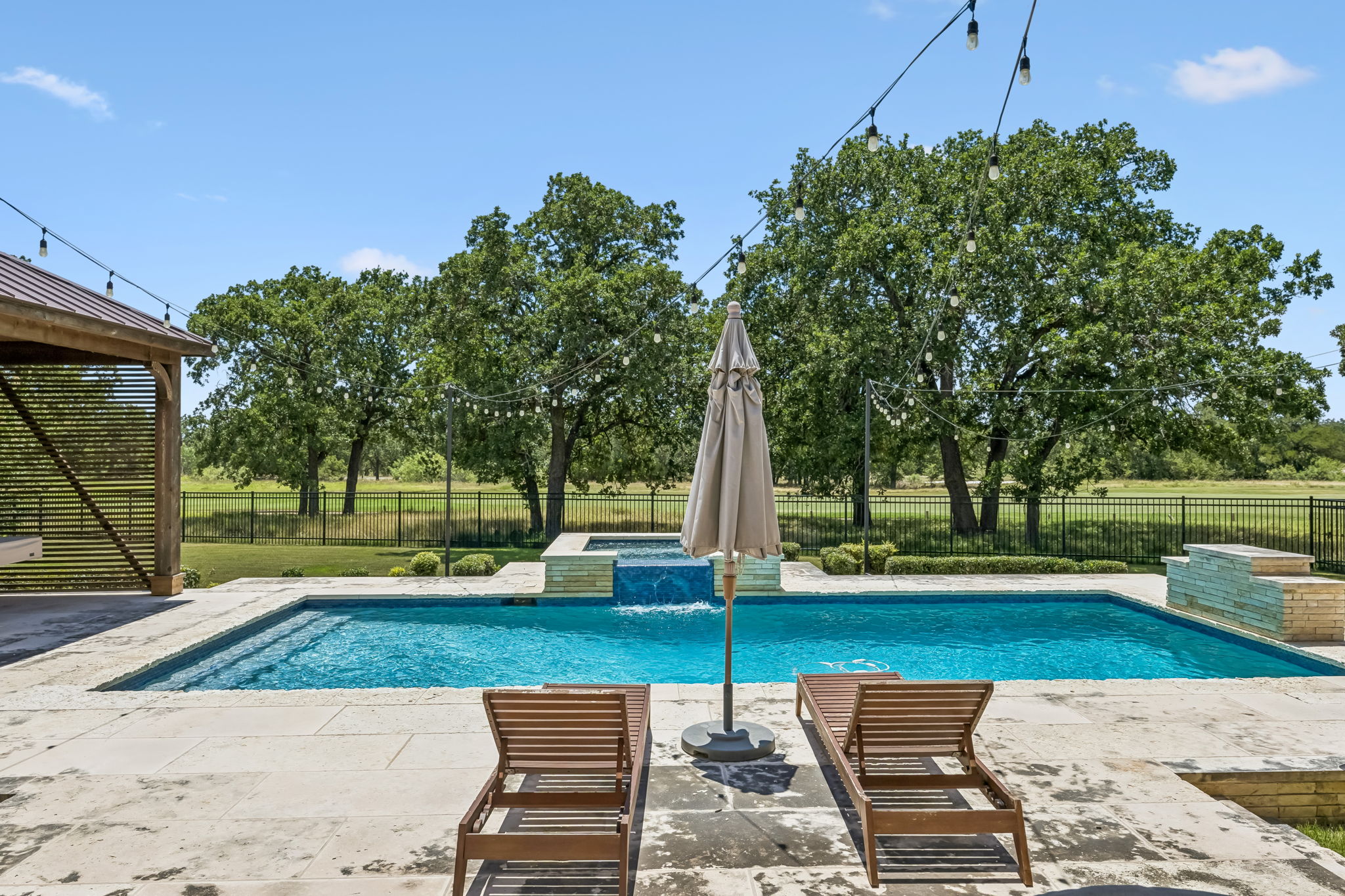 505 Flint Ridge Trail Georgetown, TX 78628 - Photo 31 of 40 The sparkling in-ground pool creates the perfect backyard escape.