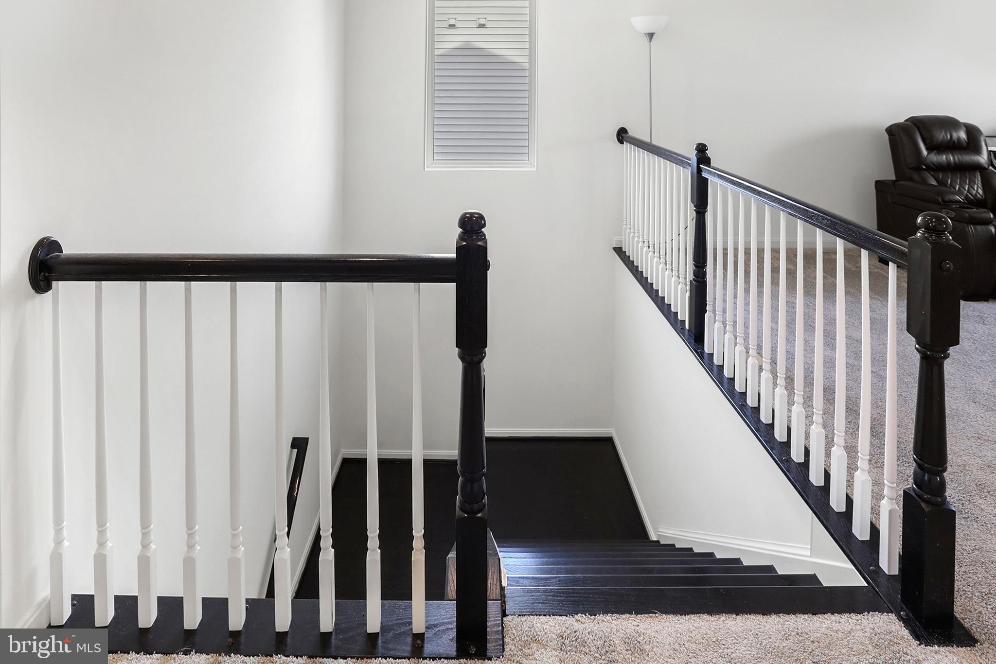 736 Round Hill Road Orange, VA 22960 - Photo 44 of 54 Beautiful black & white wood banister railings