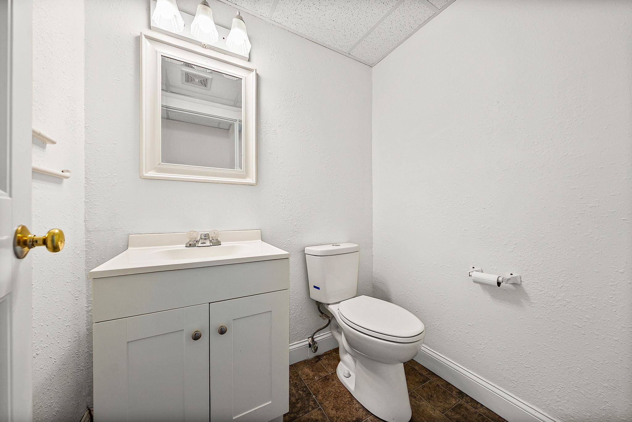 1379 C Ashland City Road Clarksville, TN 37040 - Photo 12 of 12 a bathroom with a toilet sink and mirror