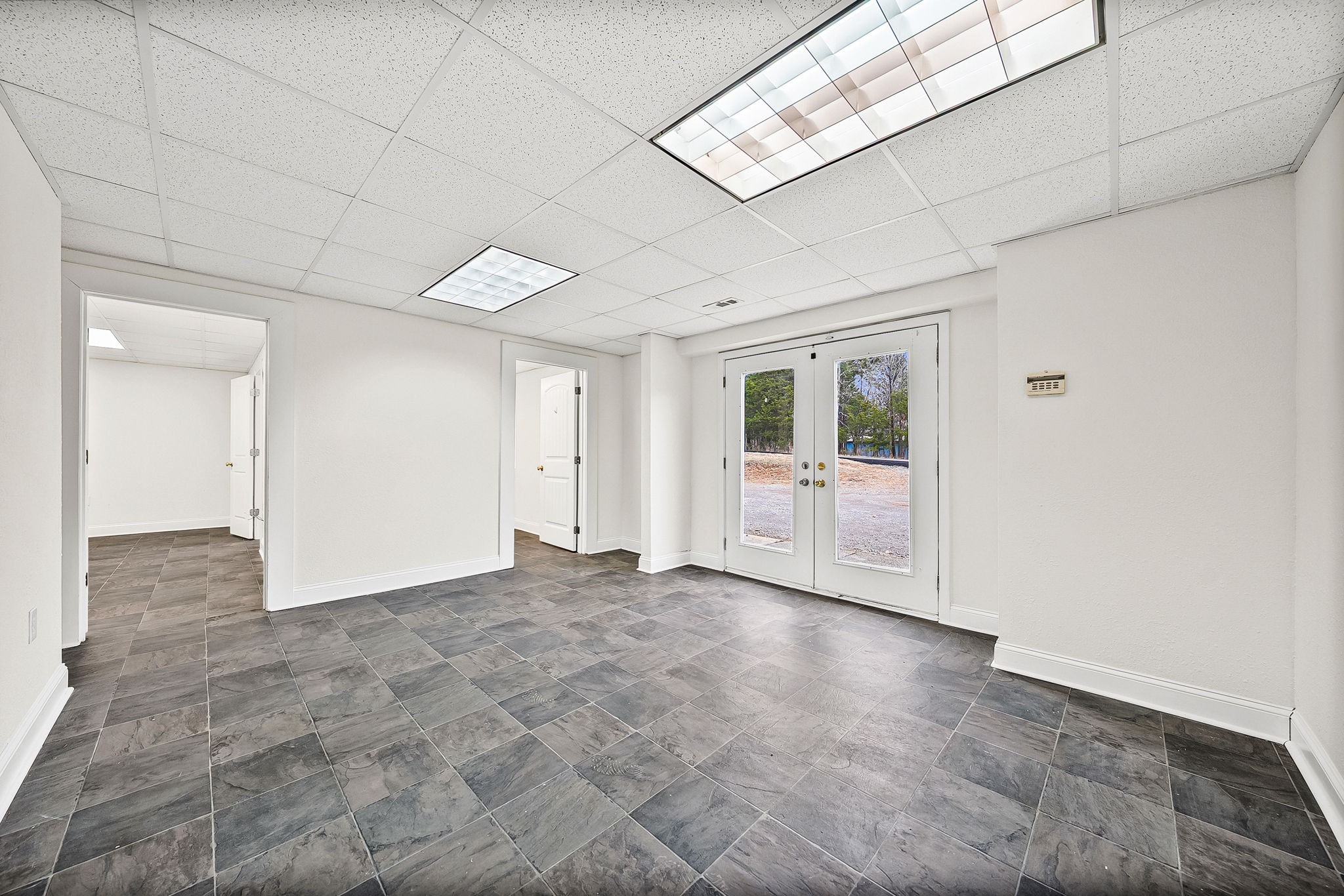 1379 C Ashland City Road Clarksville, TN 37040 - Photo 3 of 12 a view of an empty room with a window