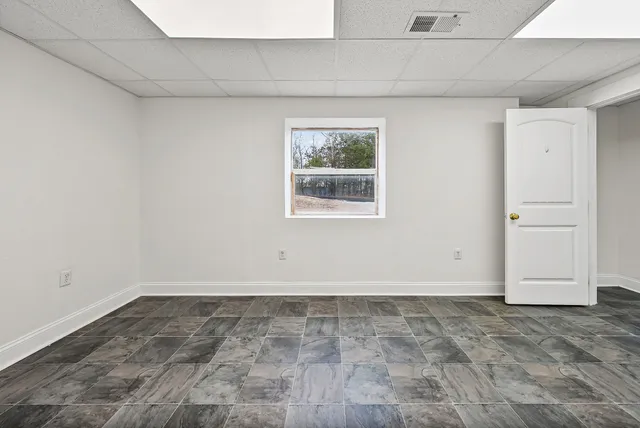 a view of a room that has a window in it