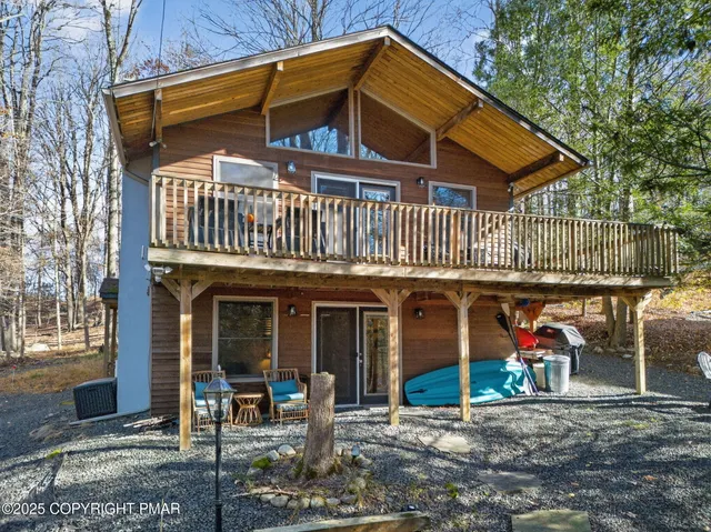 a view of a house with tub and porch