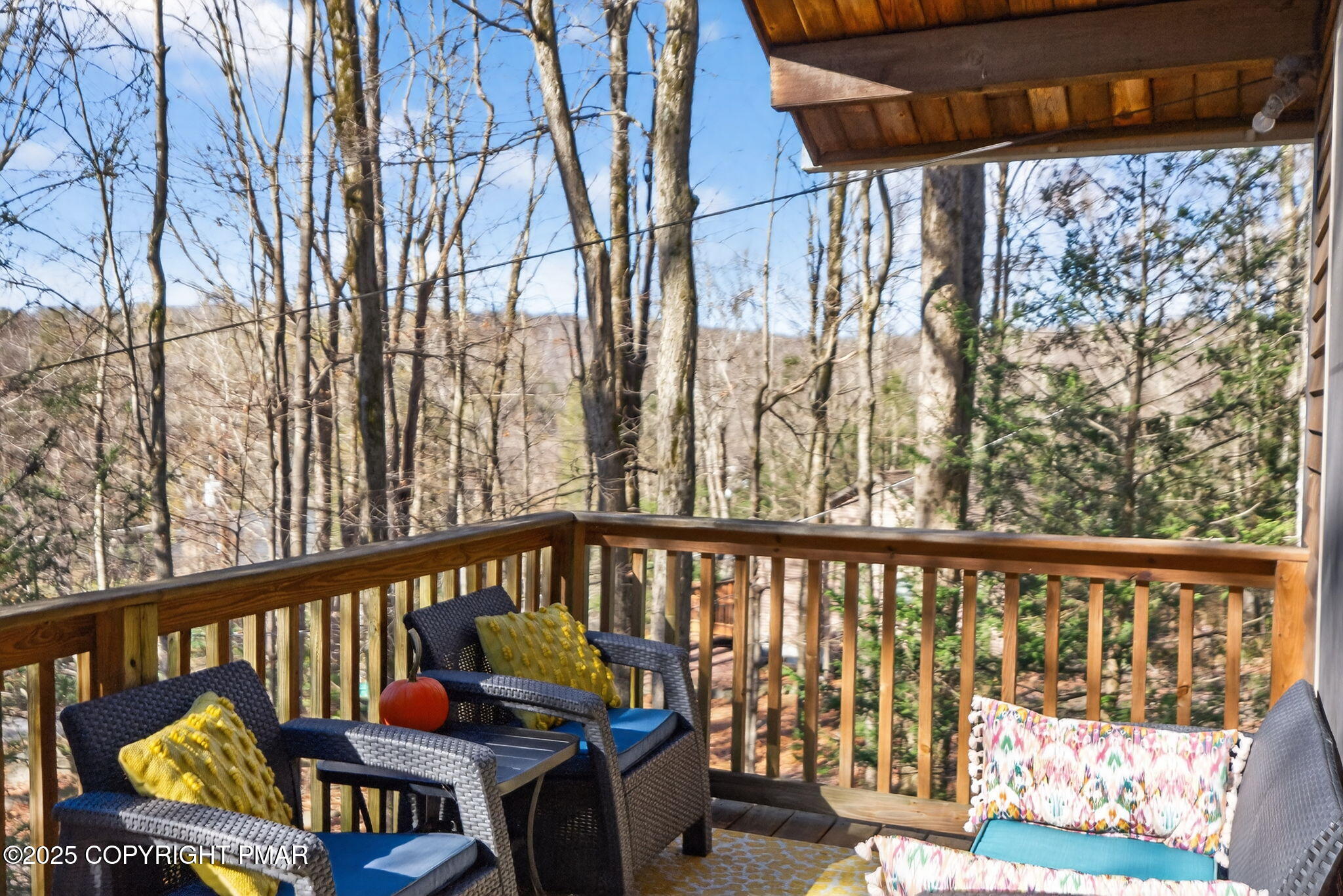 134 Deerfield Road Lake Ariel, PA 18436 - Photo 13 of 56 a view of a chairs and table in the balcony