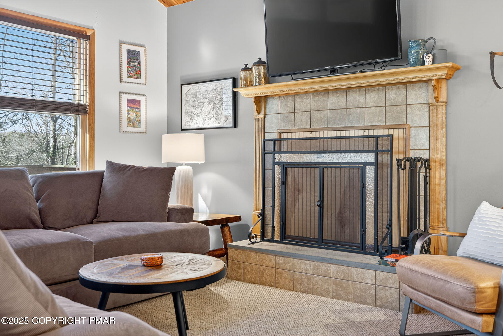 134 Deerfield Road Lake Ariel, PA 18436 - Photo 27 of 56 a living room with furniture and a fireplace