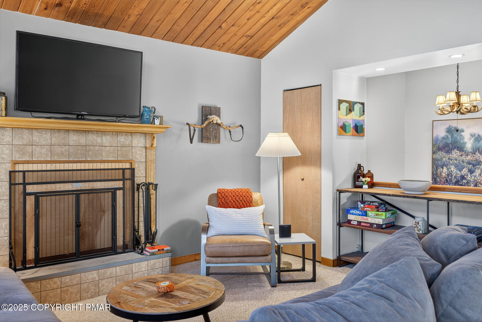 134 Deerfield Road Lake Ariel, PA 18436 - Photo 30 of 56 a living room with furniture and a fireplace