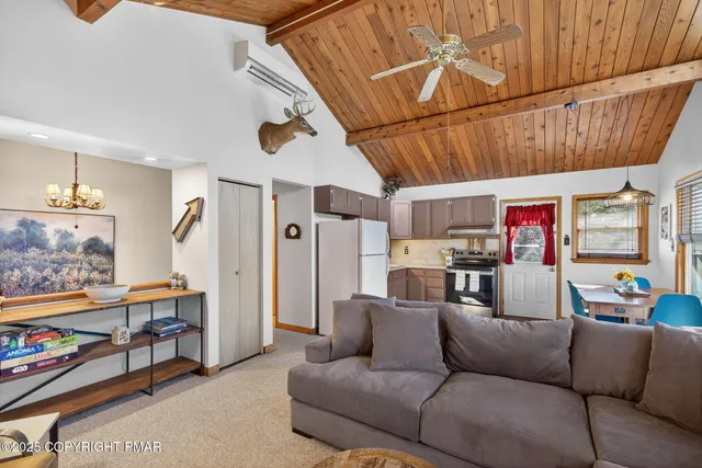 a view of a living room and dining room