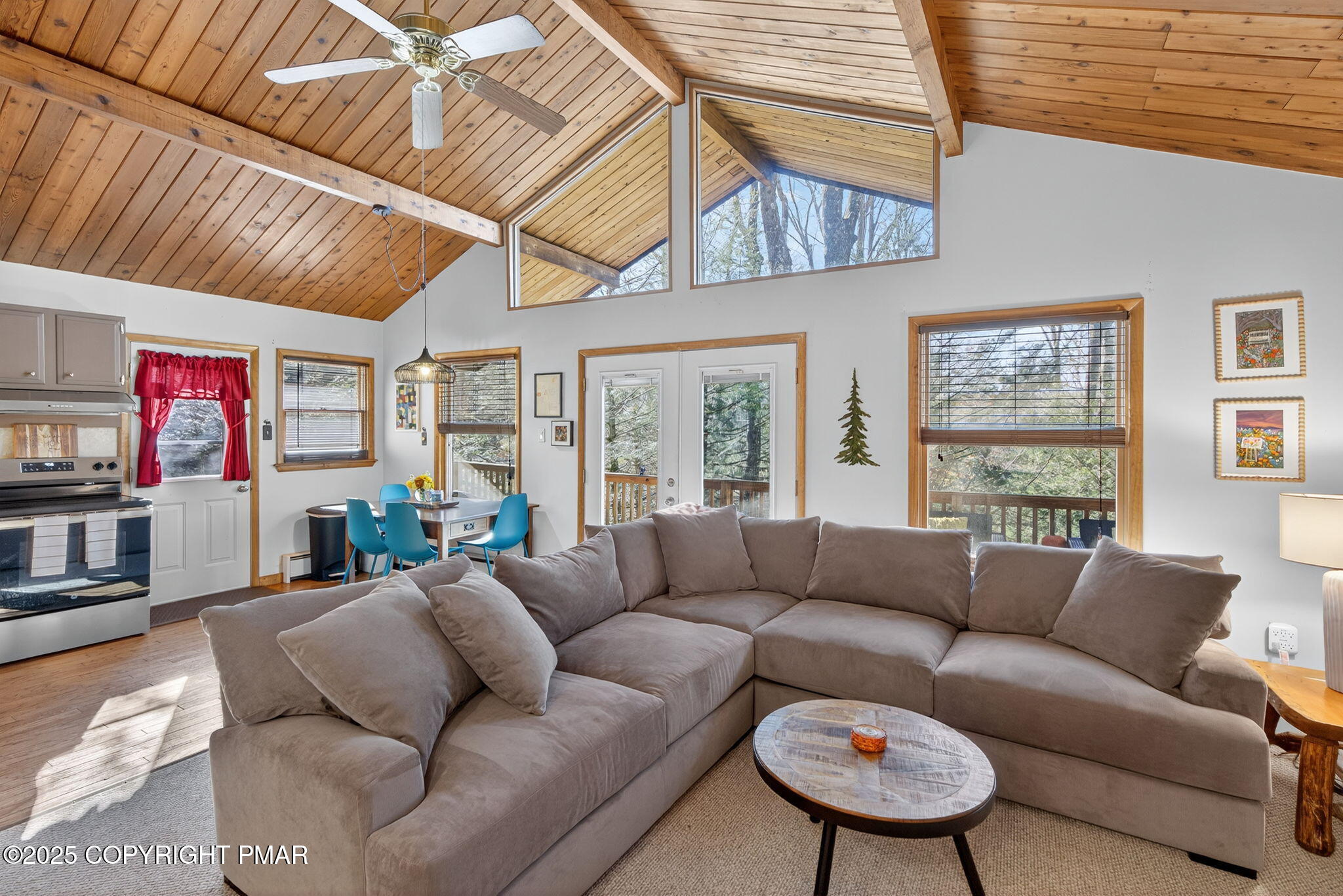 134 Deerfield Road Lake Ariel, PA 18436 - Photo 33 of 56 a living room with furniture a flat screen tv and a window