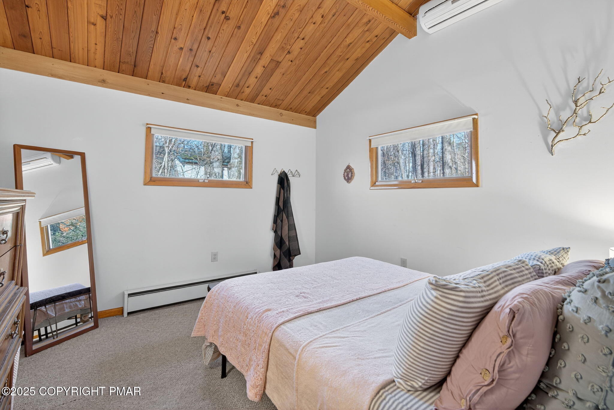 134 Deerfield Road Lake Ariel, PA 18436 - Photo 41 of 56 a bedroom with a bed and a painting on the wall