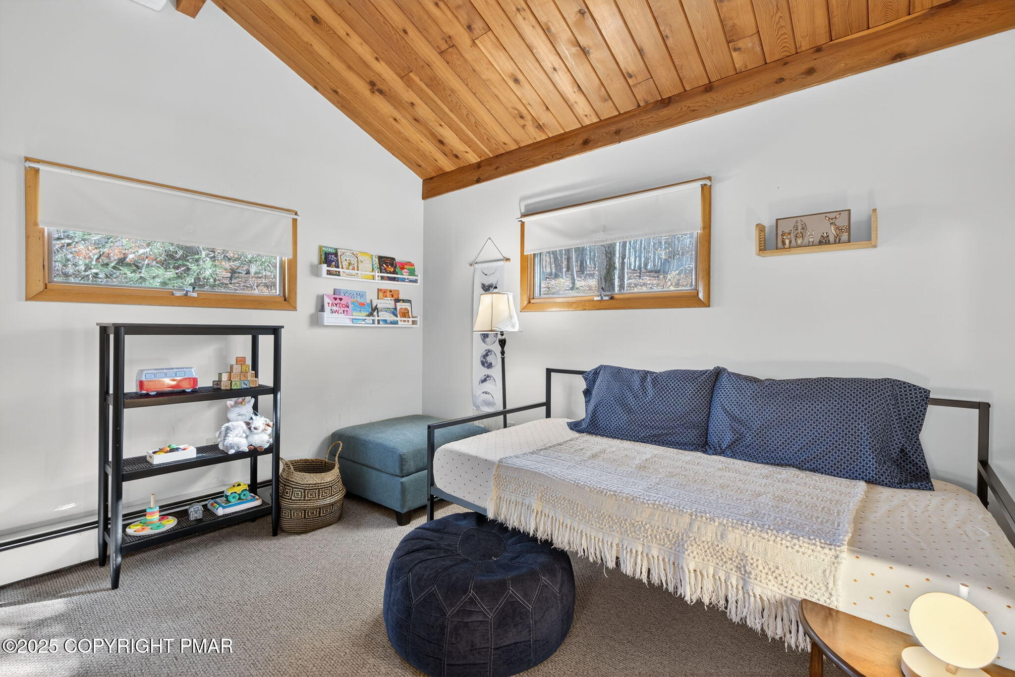 134 Deerfield Road Lake Ariel, PA 18436 - Photo 43 of 56 a living room with furniture and a baby crib