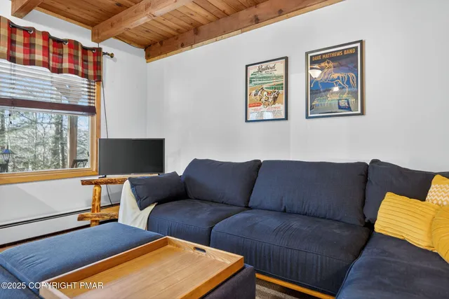 a room with furniture and a window