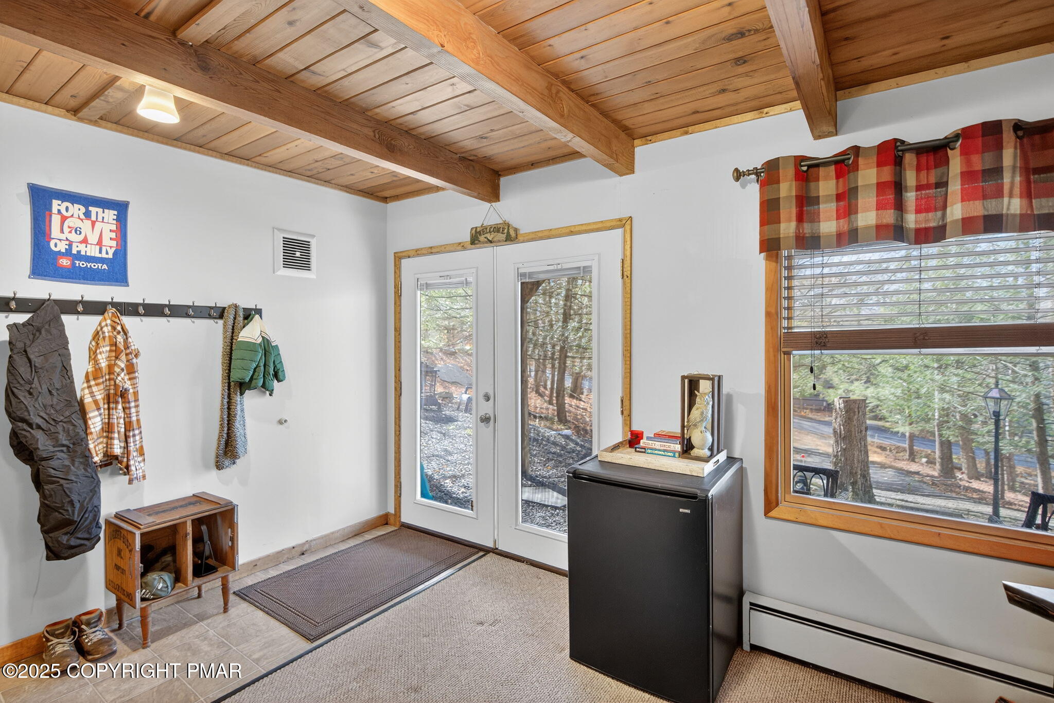 134 Deerfield Road Lake Ariel, PA 18436 - Photo 48 of 56 a view of a livingroom with furniture and a flat screen tv