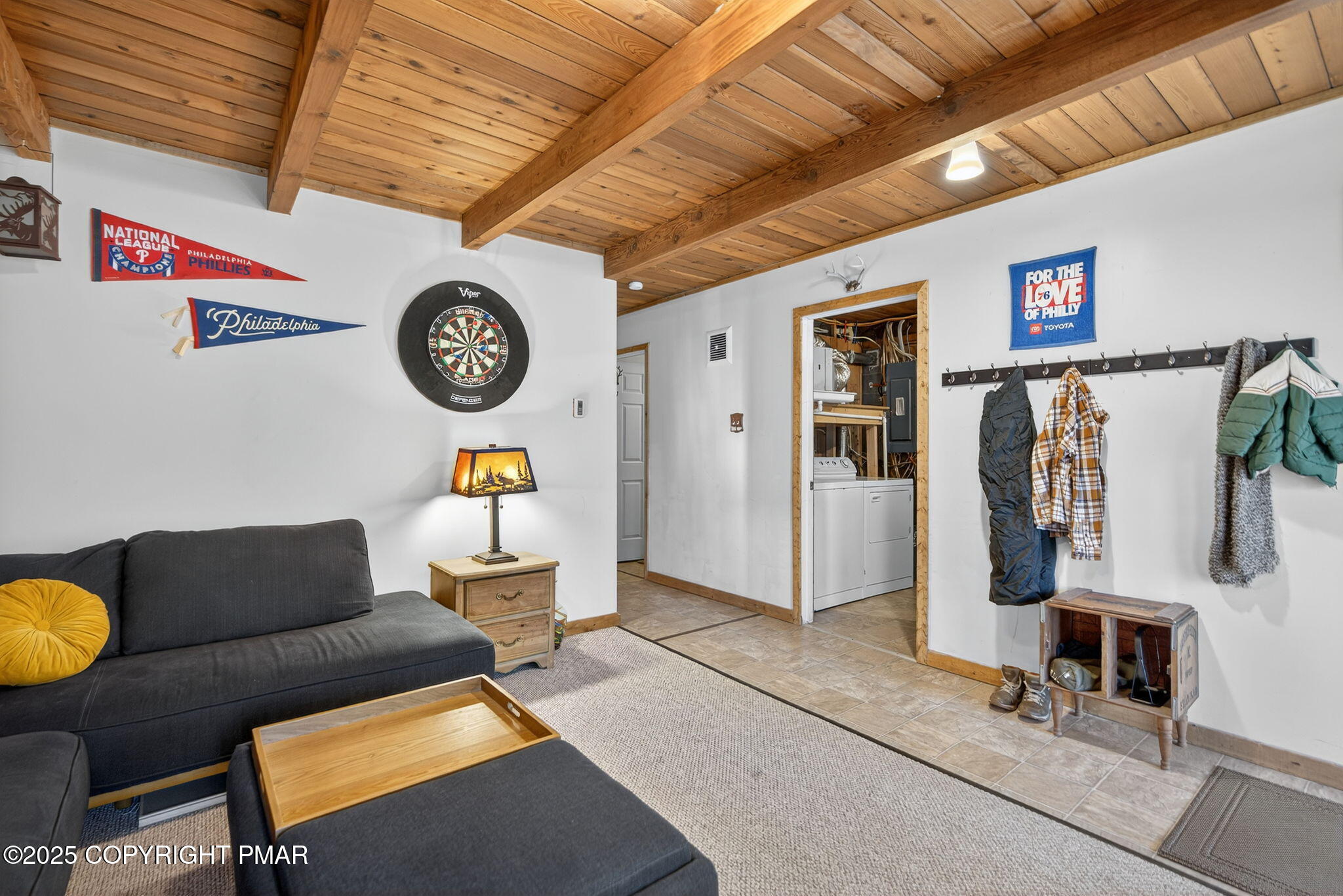 134 Deerfield Road Lake Ariel, PA 18436 - Photo 50 of 56 a living room with furniture and a clock