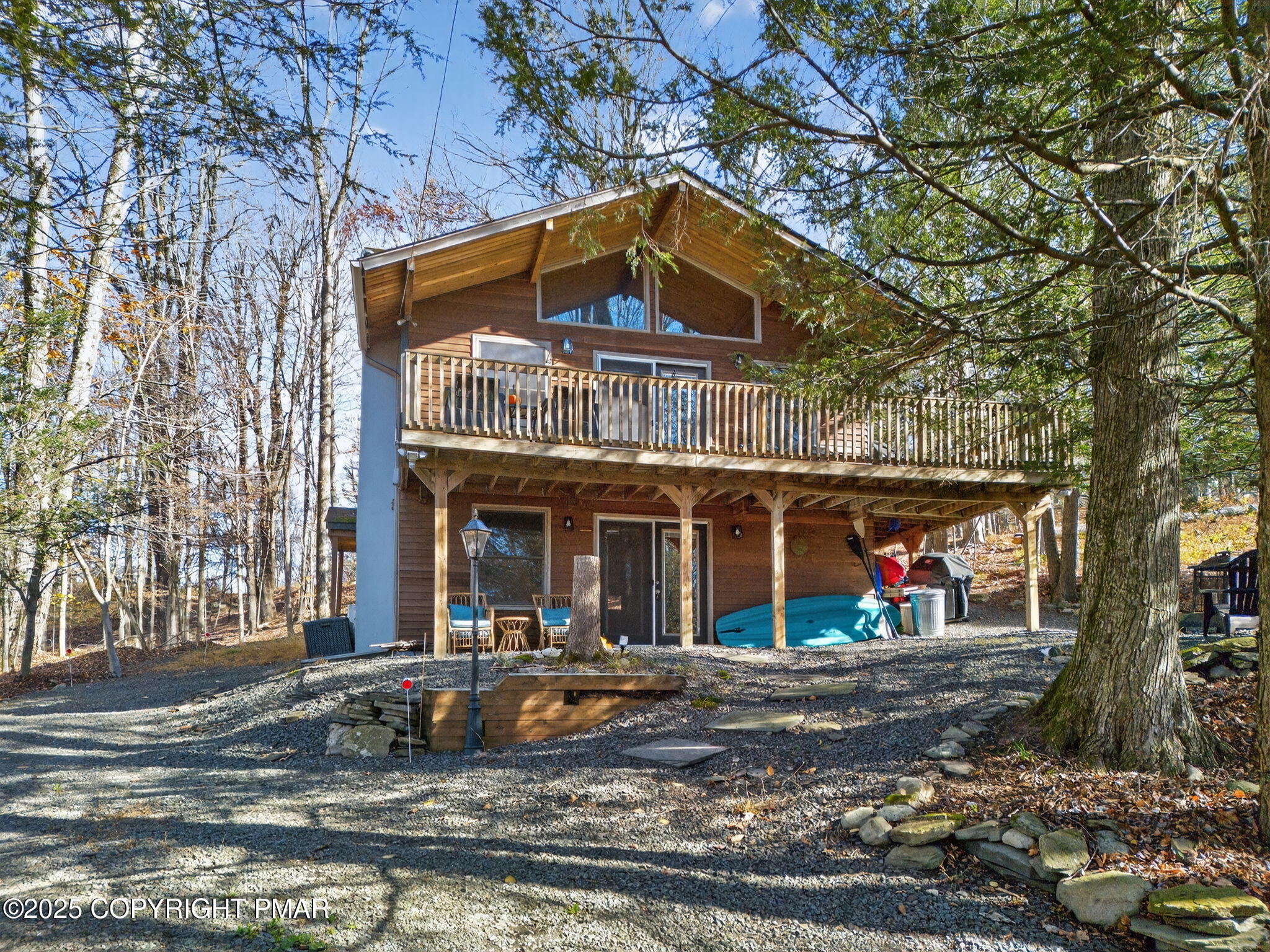134 Deerfield Road Lake Ariel, PA 18436 - Photo 5 of 56 a front view of a house with a yard