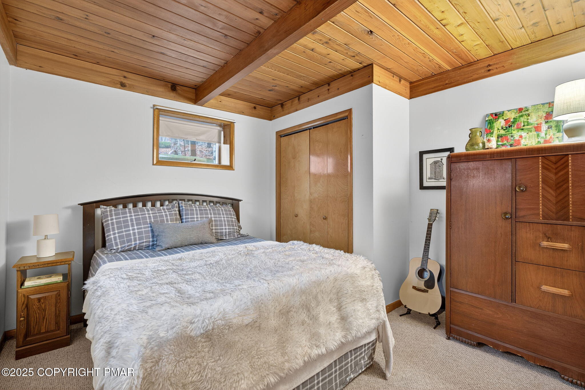 134 Deerfield Road Lake Ariel, PA 18436 - Photo 53 of 56 a large bed sitting in a bedroom next to a window