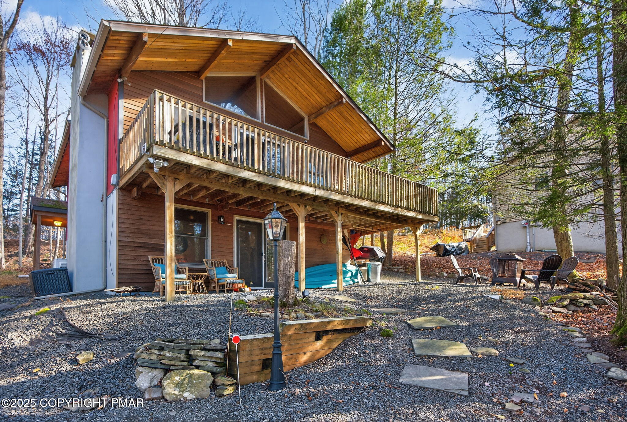 134 Deerfield Road Lake Ariel, PA 18436 - Photo 6 of 56 a view of a house with a patio