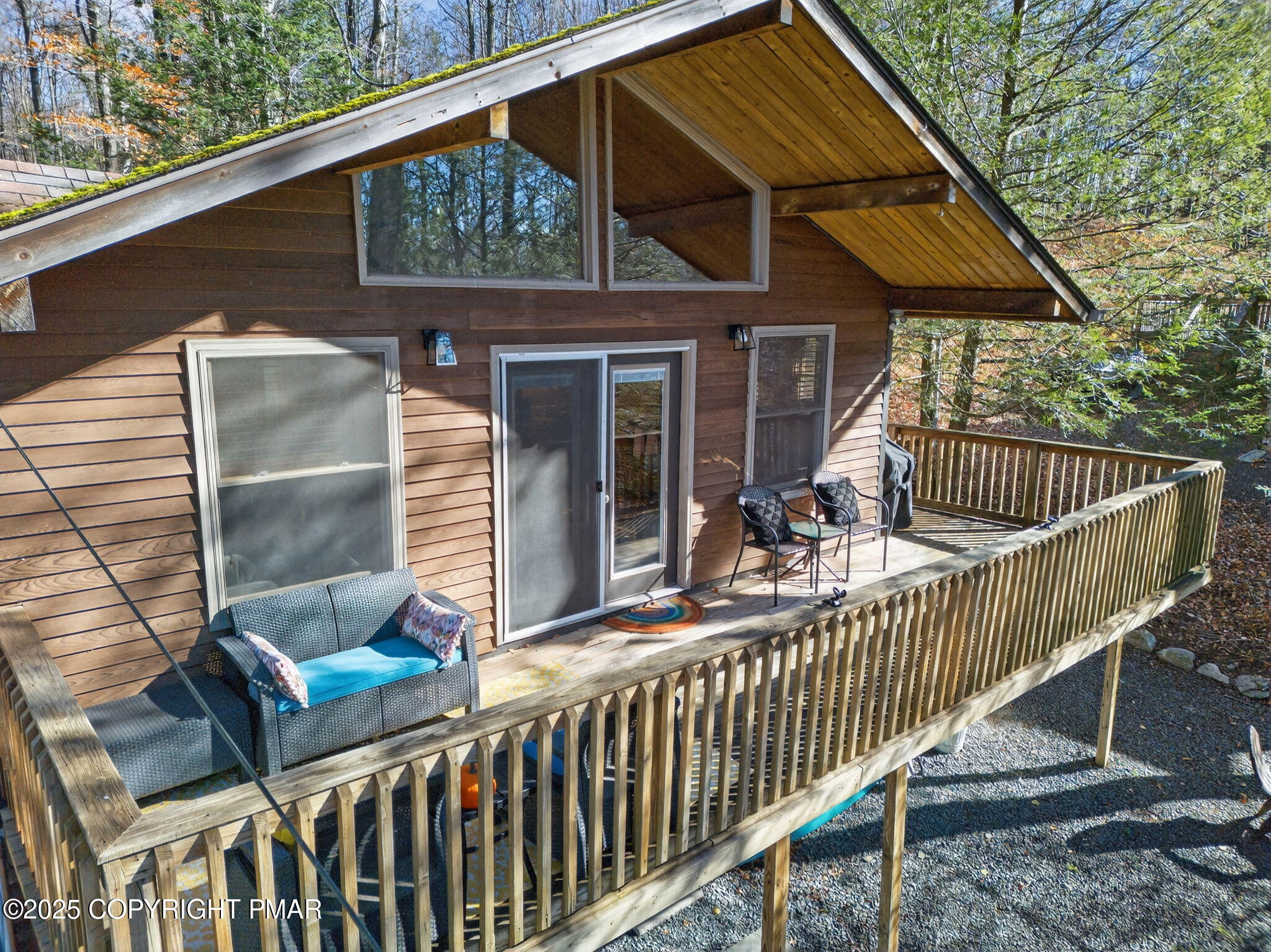 134 Deerfield Road Lake Ariel, PA 18436 - Photo 10 of 56 a view of a chair and table in the balcony