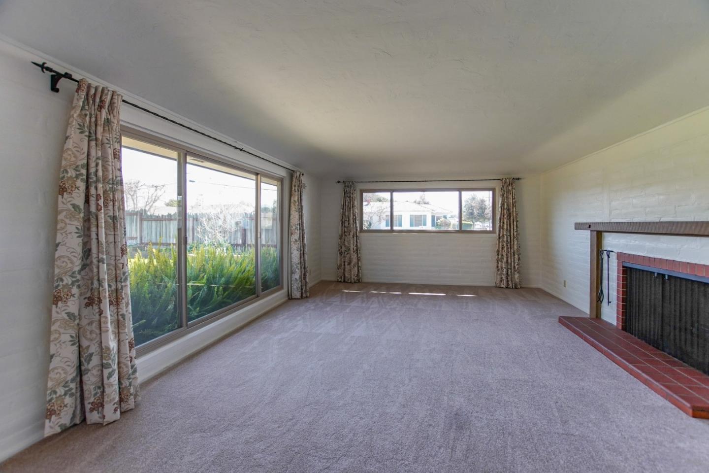 1521 Cienega Road Hollister, CA 95023 - Photo 12 of 56 a view of an empty room with windows
