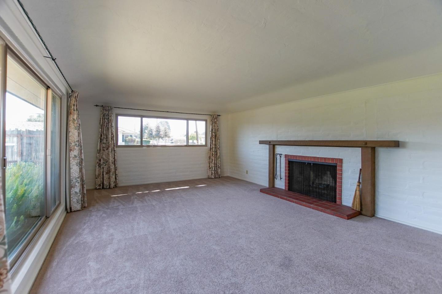 1521 Cienega Road Hollister, CA 95023 - Photo 13 of 56 an empty room with windows