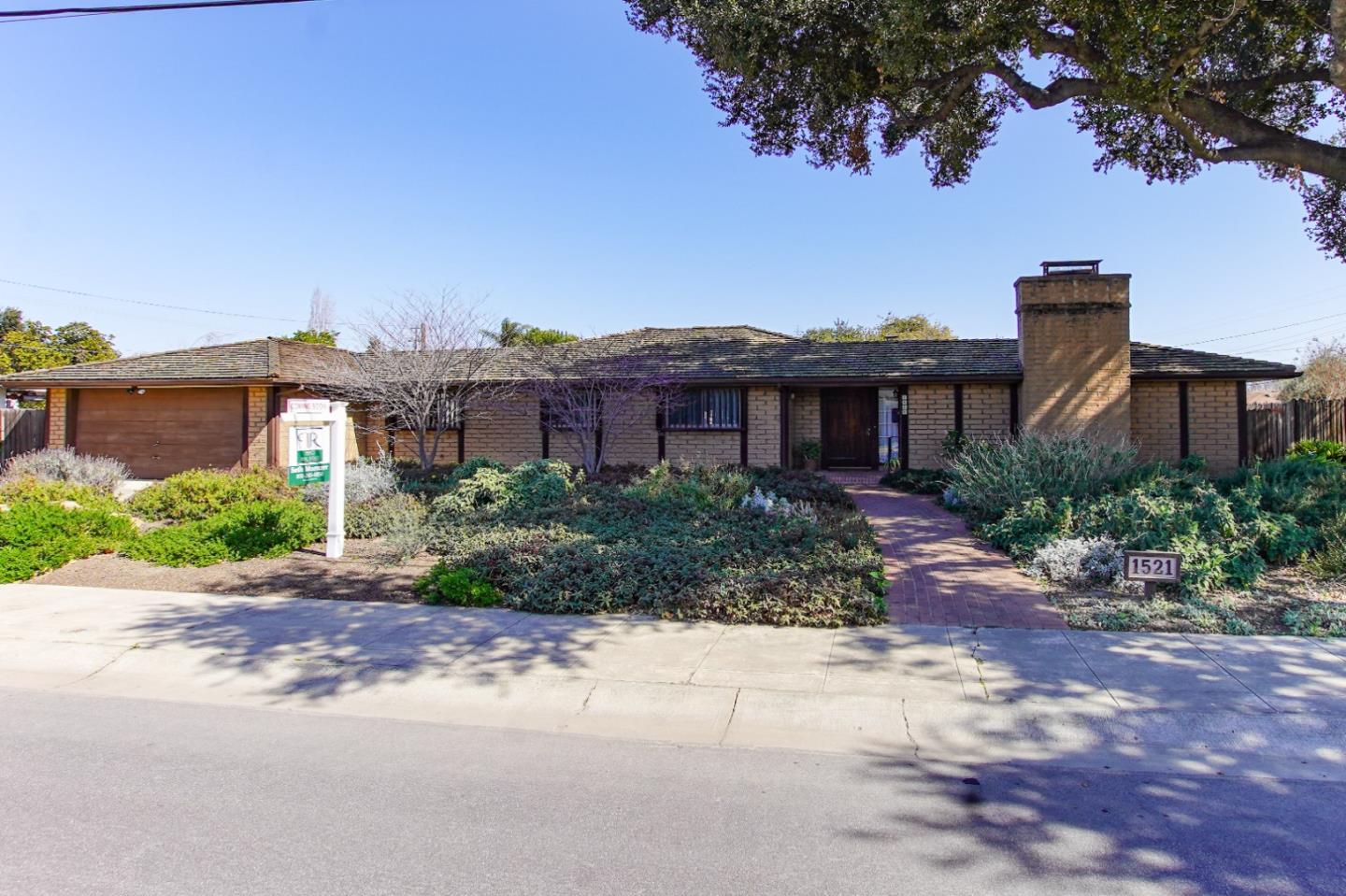 1521 Cienega Road Hollister, CA 95023 - Photo 2 of 56 a front view of a house with a garden