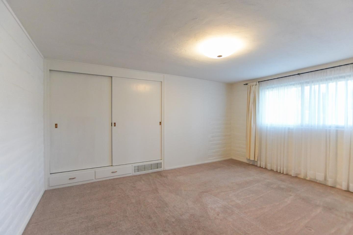 1521 Cienega Road Hollister, CA 95023 - Photo 26 of 56 a view of an empty room and window