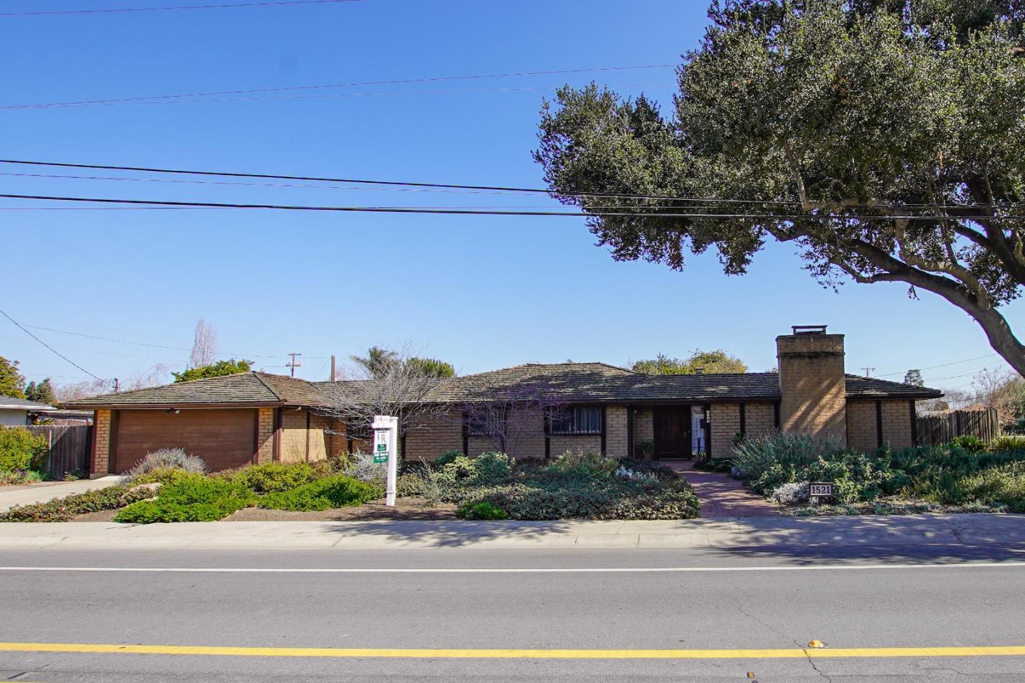 1521 Cienega Road Hollister, CA 95023 - Photo 3 of 56 a view of a building with a street