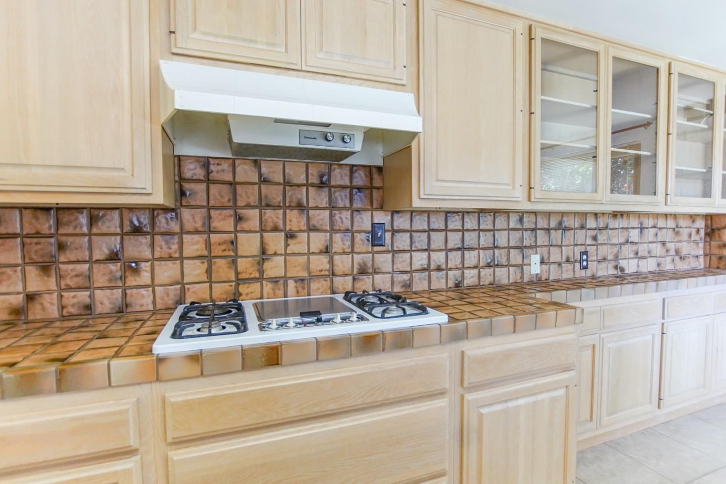1521 Cienega Road Hollister, CA 95023 - Photo 43 of 56 a kitchen with a sink and cabinets