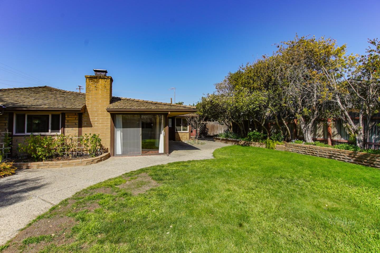 1521 Cienega Road Hollister, CA 95023 - Photo 47 of 56 a front view of a house with garden