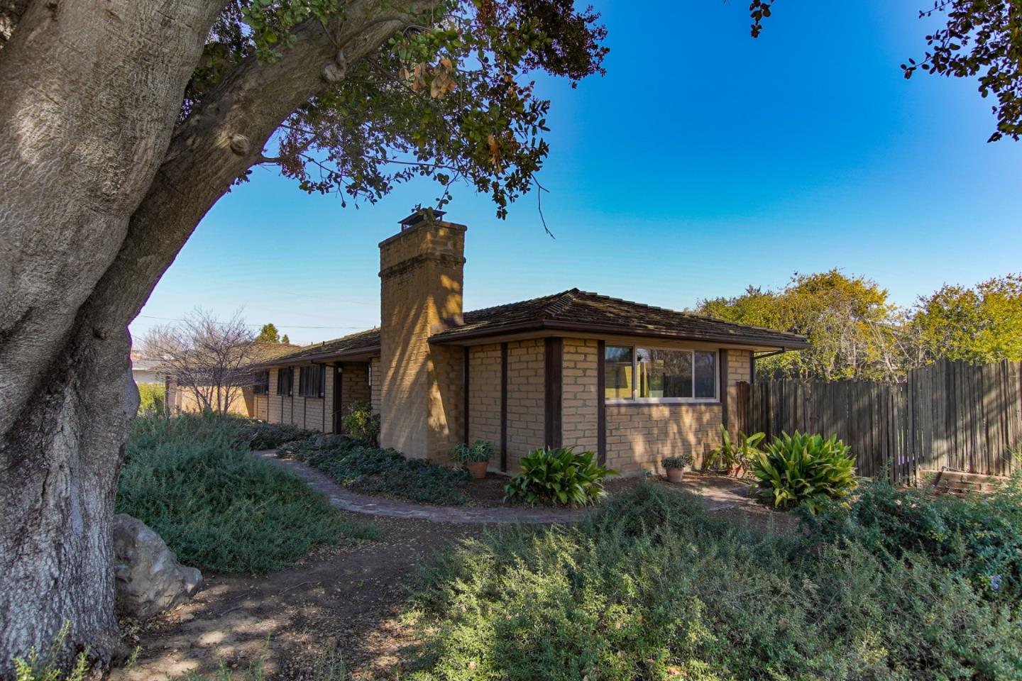 1521 Cienega Road Hollister, CA 95023 - Photo 5 of 56 a front view of a house with garden