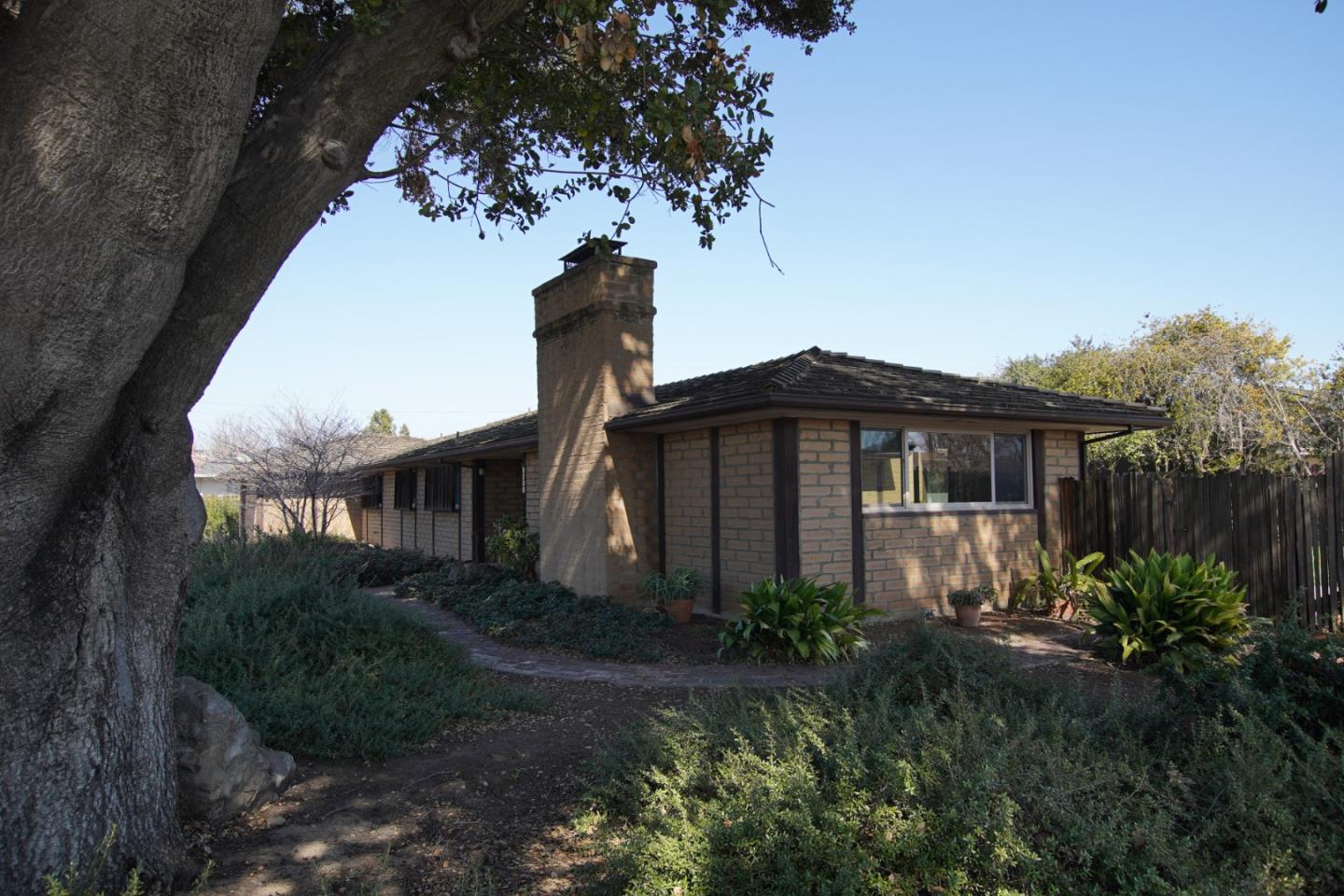 1521 Cienega Road Hollister, CA 95023 - Photo 6 of 56 a front view of a house with garden