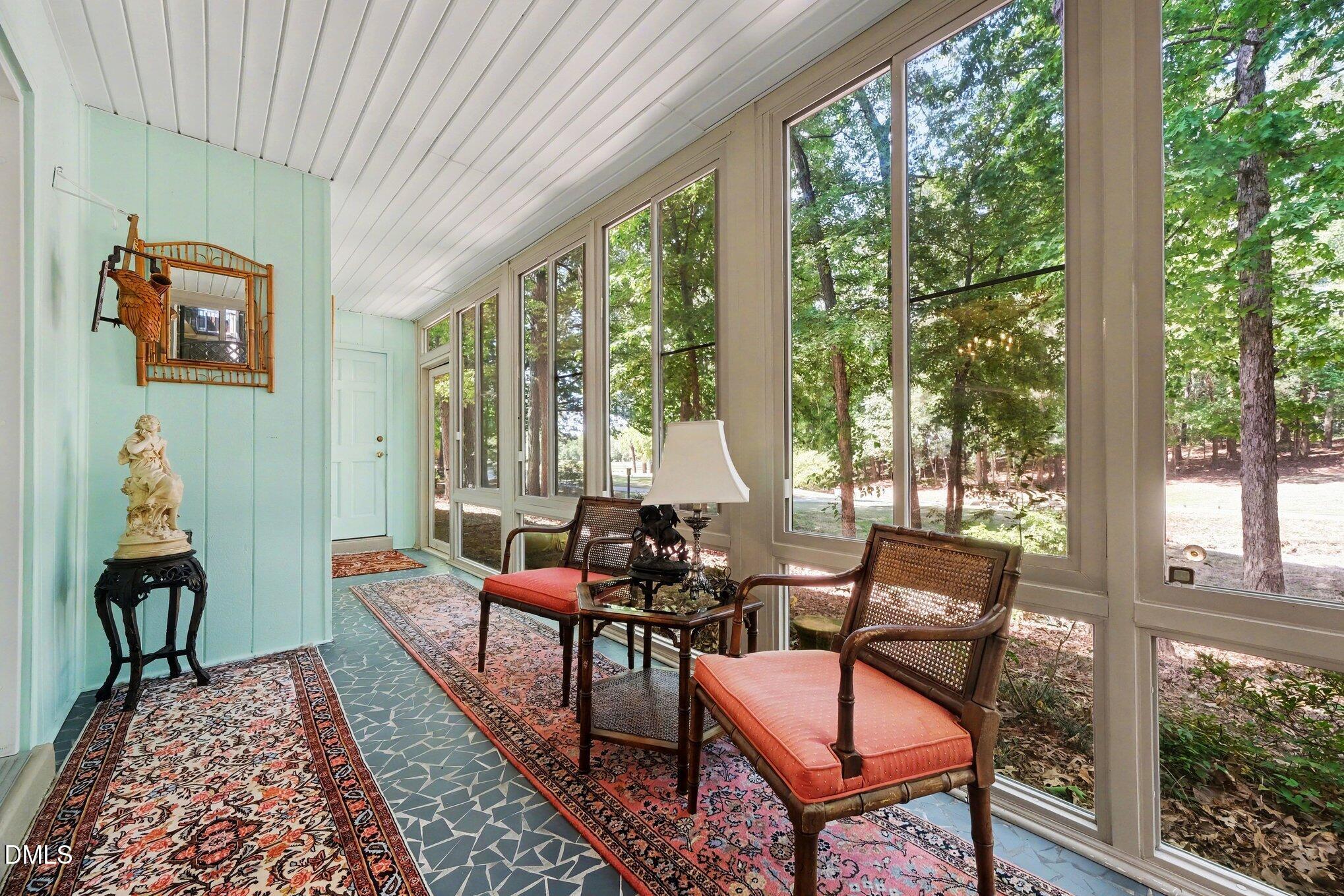 1911 Front Street, Unit 3B Durham, NC 27705 - Photo 12 of 33 a living room with furniture and a large window