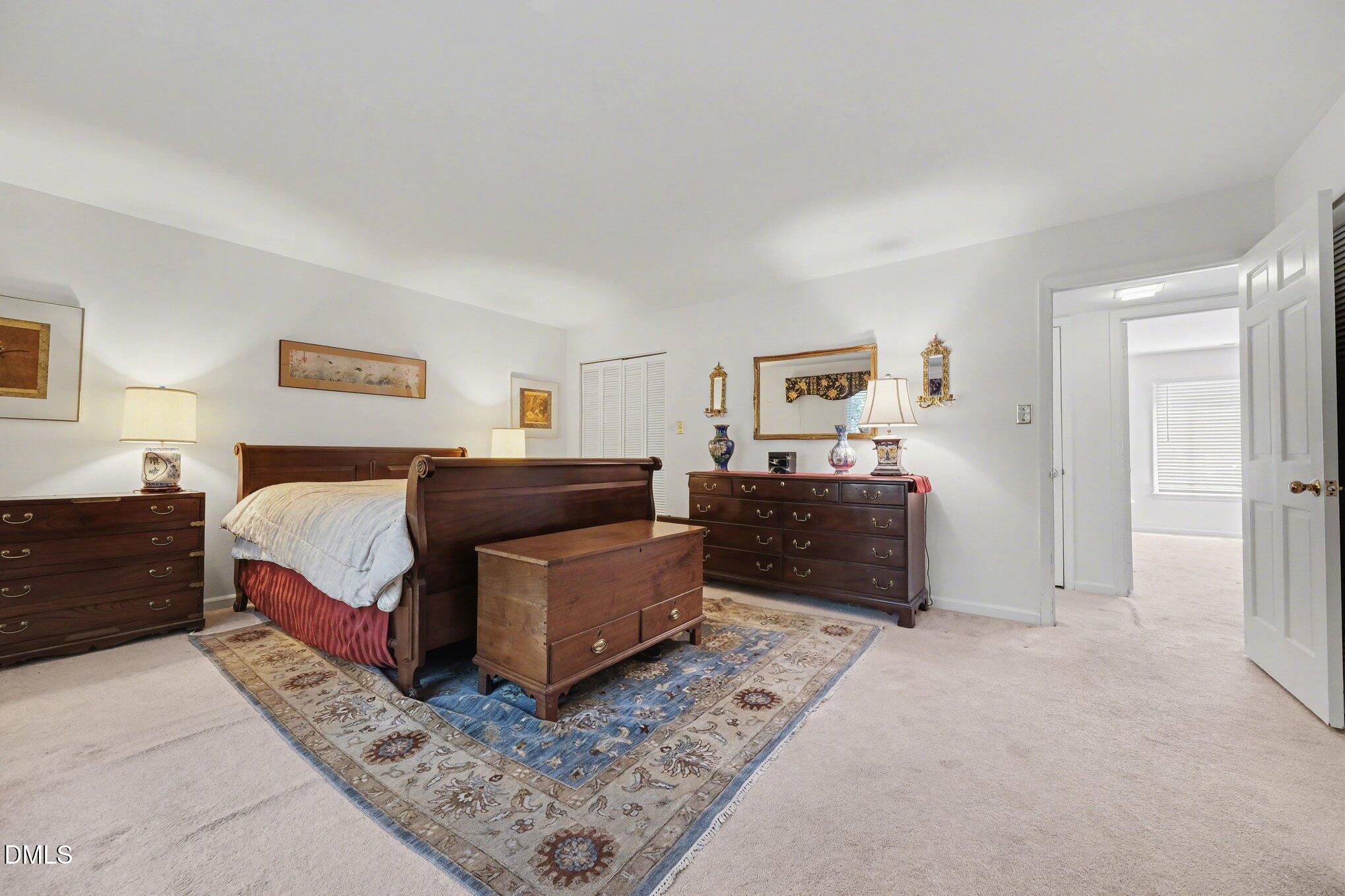 1911 Front Street, Unit 3B Durham, NC 27705 - Photo 16 of 33 a bedroom with a bed and a couch