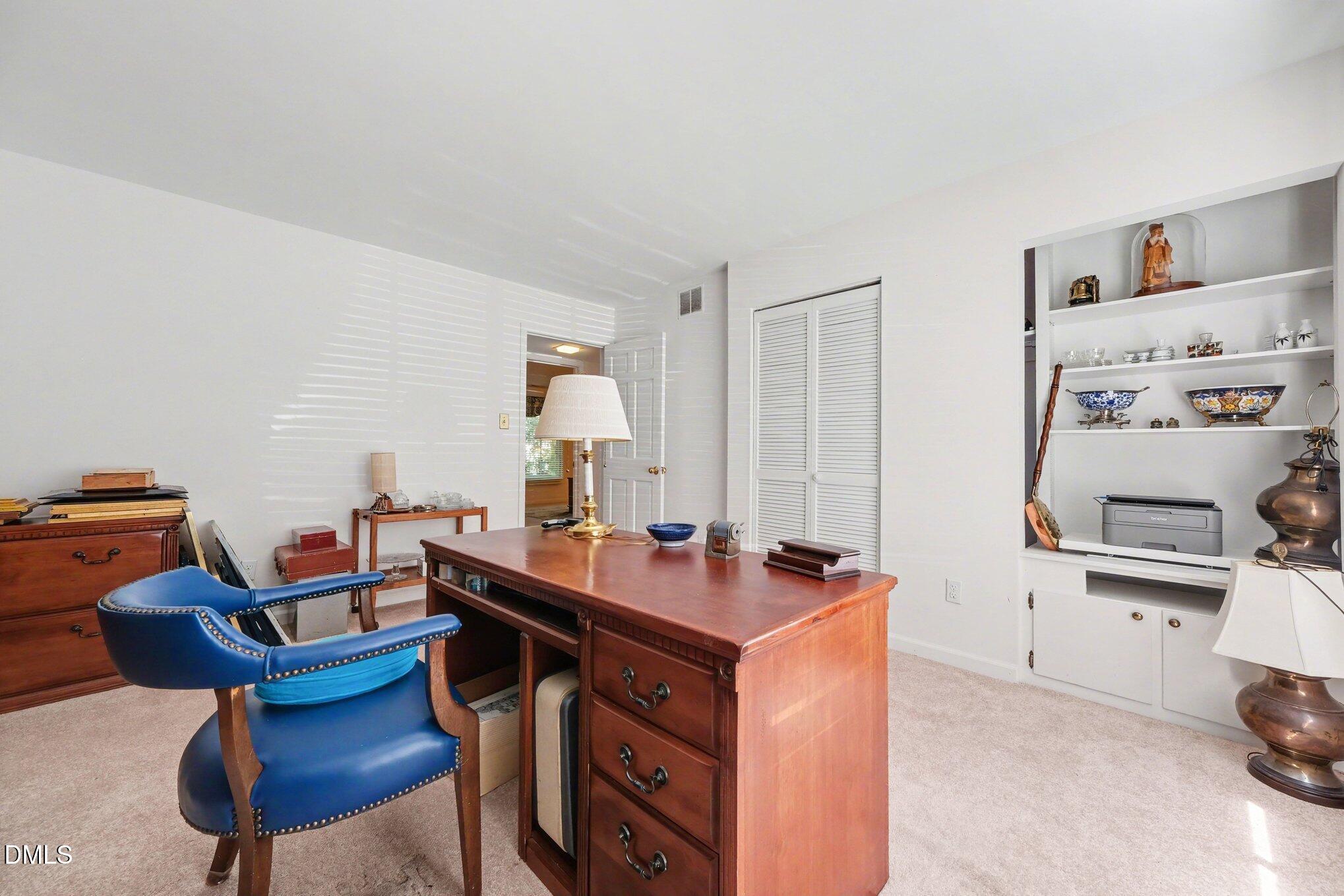 1911 Front Street, Unit 3B Durham, NC 27705 - Photo 21 of 33 a dining room with a desk and chairs